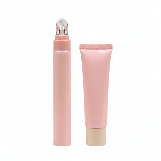 Pink eye cream roller pen tube front view white background