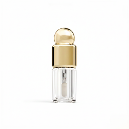 Round gold ball cap lip gloss tube white background hero shot